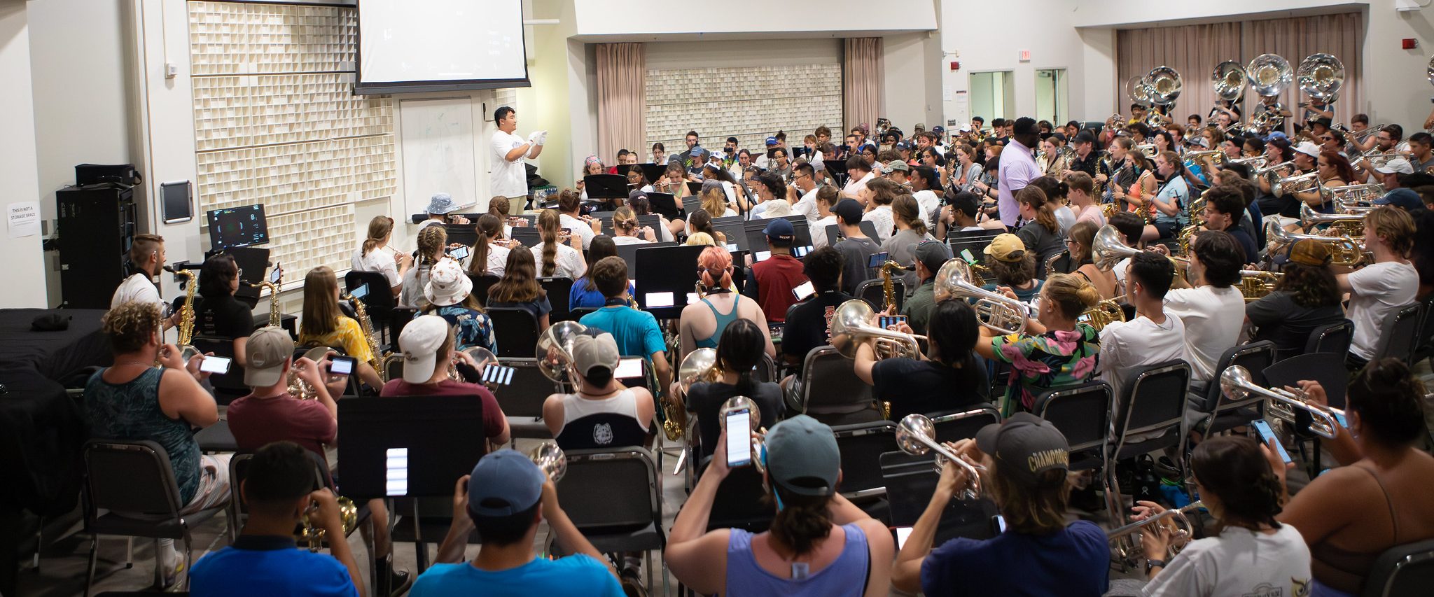 The 2023 UCMB rehearses in MUSB 102